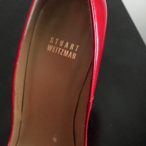 Sleek Red Patent Leather Heels.